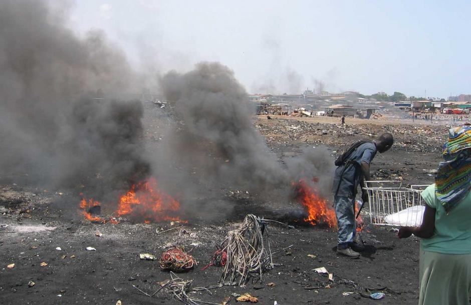 Burning cables for the copper at Agbobloshie, Accra, Ghana